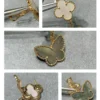 Lucky Alhambra earrings, 2 motifs 18K yellow gold, Mother-of-pearl, Tiger Eye