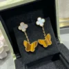 Lucky Alhambra earrings, 2 motifs 18K yellow gold, Mother-of-pearl, Tiger Eye