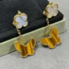 Lucky Alhambra earrings, 2 motifs 18K yellow gold, Mother-of-pearl, Tiger Eye