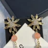 2024/25 Métiers d’art  Chanel Pendant Earrings  Metal, Natural Stones, Glass, Strass  Gold, Pink & Crystal
