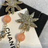 2024/25 Métiers d’art  Chanel Pendant Earrings  Metal, Natural Stones, Glass, Strass  Gold, Pink & Crystal