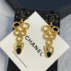 2024/25 Métiers d’art  Chanel Pendant Earrings  Metal & Resin  Golden & Black