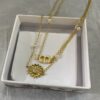CD Multi Flowers Necklace Gold-Finish Metal, White Resin Pearls and Crystals